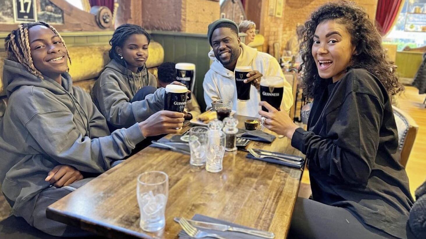 Kevin Hart with wife Eniko Parrish and his children at Belfast&#39;s Kitchen Bar on Saturday. Picture: Kevin Hart Facebook 