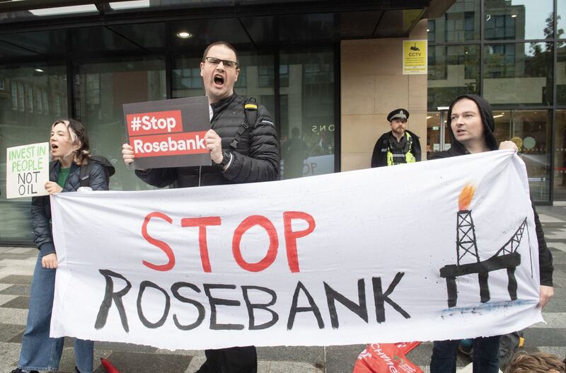Campaigners take part in a Stop Rosebank protest outside the UK Government building in Edinburgh in September
