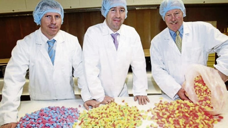 Crilco Confections founder Peter Crilly (right) with sons Ciaran and David, directors of the Newry firm 