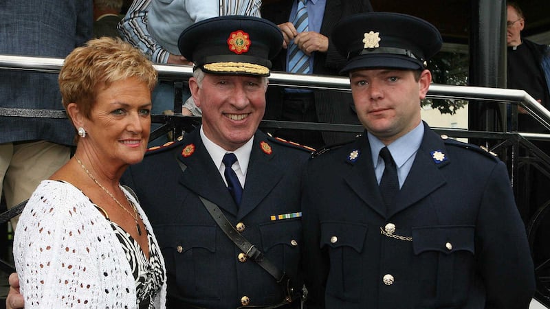 Ann McCabe, widow of Garda Jerry McCabe, with then Garda Commissioner Fachtna Murphy and her son Garda Ross McCabe who graduated as a garda in 2008. Picture by Niall Carson, PA Wire
