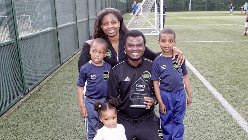 Sport NI Volunteer of the Year Adekanmi Abayomi pictured with his family.<br /> Picture by Freddie Parkinson/Press Eye