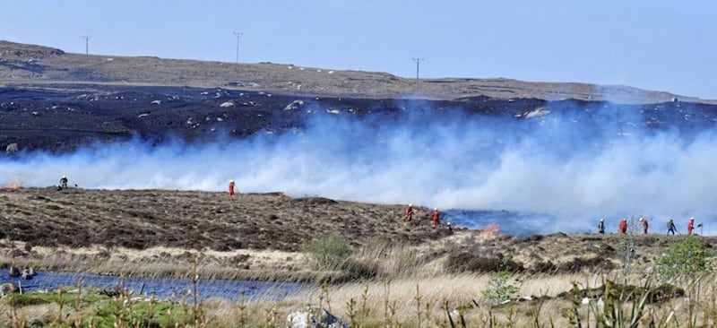Fire crews from 13 brigade areas were supported by dozens of local people to halt the spread of the fires. Picture by Colm Lenaghan, Pacemaker