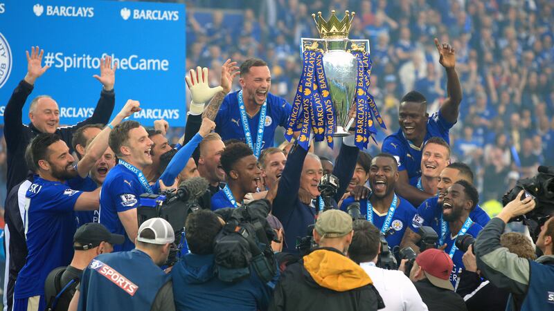 Leicester’s players and manager Claudio Ranieri celebrate the Premier League title in 2016