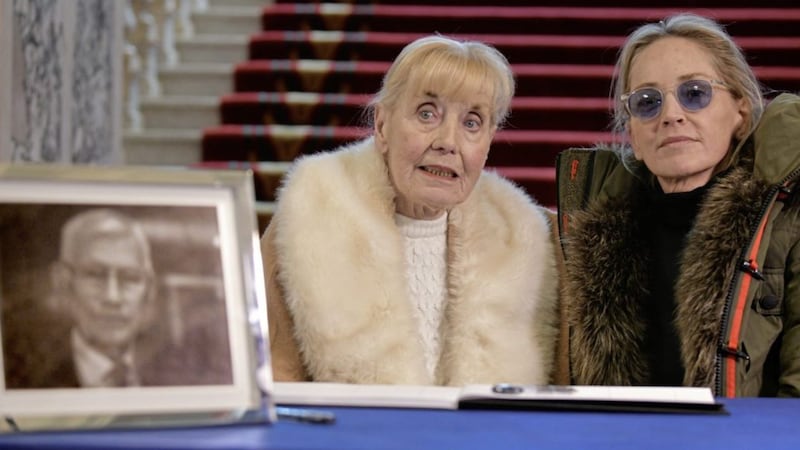 Betty Williams and Hollywood star Sharon Stone pictured in Belfast City Hall in January, where they signed a Book of Condolance for former Deputy First Minister Seamus Mallon. Picture by Alan Lewis 