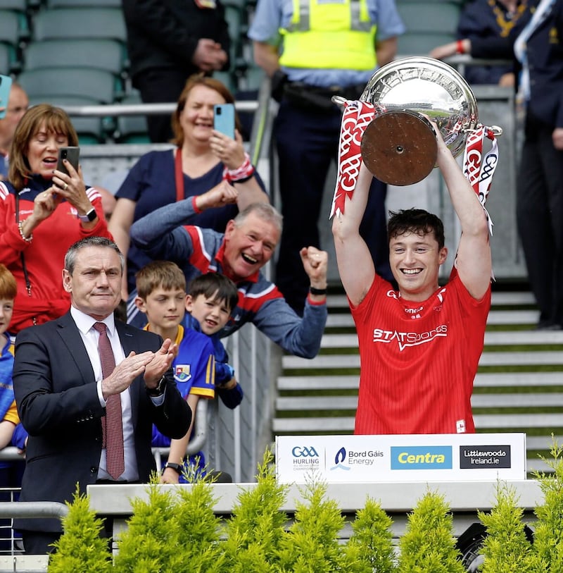 Louth&#39;s Feidhleim Joyce lifts the Lory Meagher Cup in 2022. A CCCC proposal wants the removal of five counties from the NHL in 2025 Picture: Philip Walsh. 