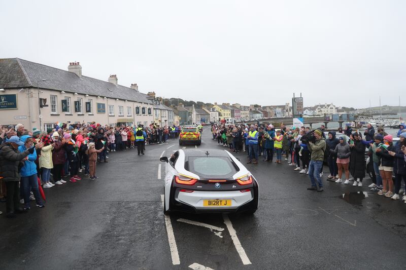 Wellwishers line the streets of Portaferry to welcome home Ciara Mageean. Picture by Mal McCann
