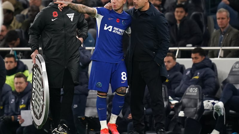 Chelsea’s Enzo Fernandez gets instructions from manager Mauricio Pochettino during the Premier League match at the Tottenham Hotspur Stadium, London. Picture date: Monday November 6, 2023.