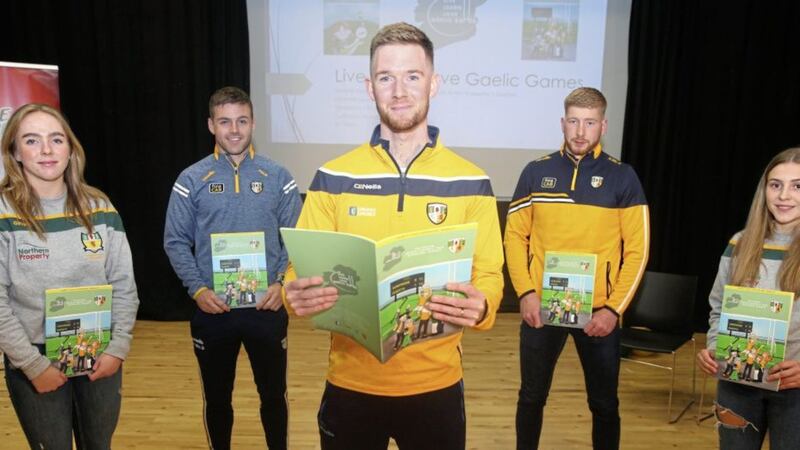 Michael Gerard &Oacute; Dochartaigh launching &#39;Live, Learn, Love&#39; Gaelic Games&#39; booklets with Antrim players Niamh Enright, Padraig McBride, Niall McKenna and D&uacute;ana Colman in the Culturlann as part of the F&eacute;ile na Carraige community festival in west Belfast. Picture by Mal McCann 