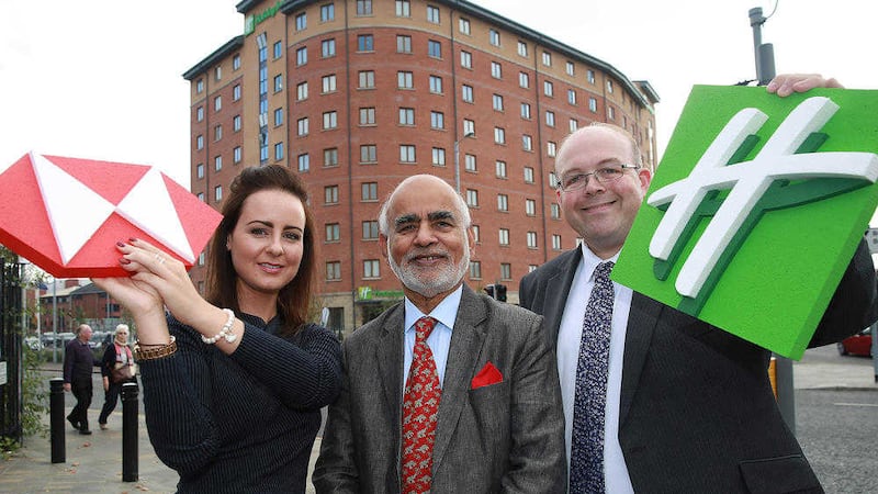 Lord Rana (centre) with HSBC Bank corporate manager Lauren Hughes and IHG Europe director Philip Turner 