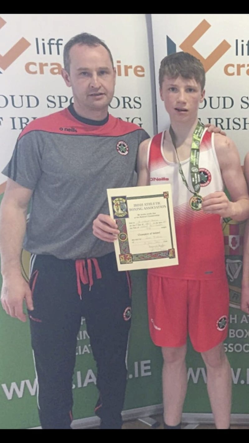 Ronan McNamee, of St John&rsquo;s boxing club in Swatragh, defeated Dublin&rsquo;s Larry Connors in the Irish Boy 3 bantamweight final. He is pictured with coach Ciaran Quinn 