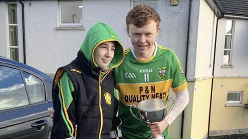 14-year-old Fintan O&#39;Neill, who was hit by a car in January, pictured with Glen&#39;s U21 Ulster title winning captain Conor Convery. Picture from Facebook/St Patrick&#39;s College Maghera 
