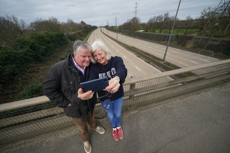 Fiona and Patrick Potter, residents of West Byfleet take a selfie on the Parvis Road bridge in Byfleet