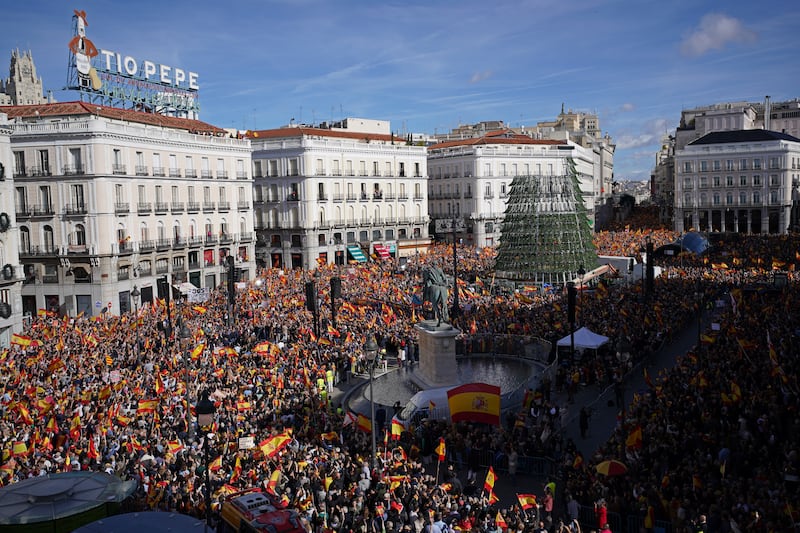 Crowds with Spanish flags packed the central Puerta del Sol during a protest called by Spain’s Conservative Popular Party in Madrid in November last year (Joan Mateu Parra/AP)