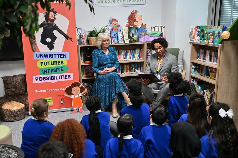 Queen Camilla and pupils listen to Waterstones Children’s Laureate and poet Joseph Coelho