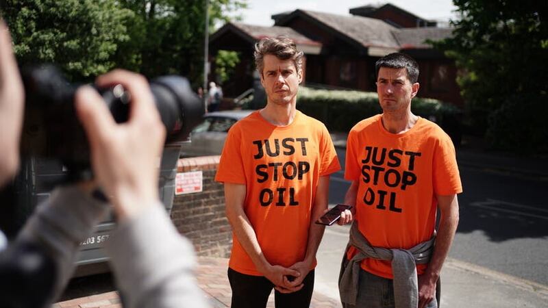 Just Stop Oil protesters Samuel Johnson and Patrick Hart, left, at Wimbledon Magistrates’ Court (Jordan Pettitt/PA)