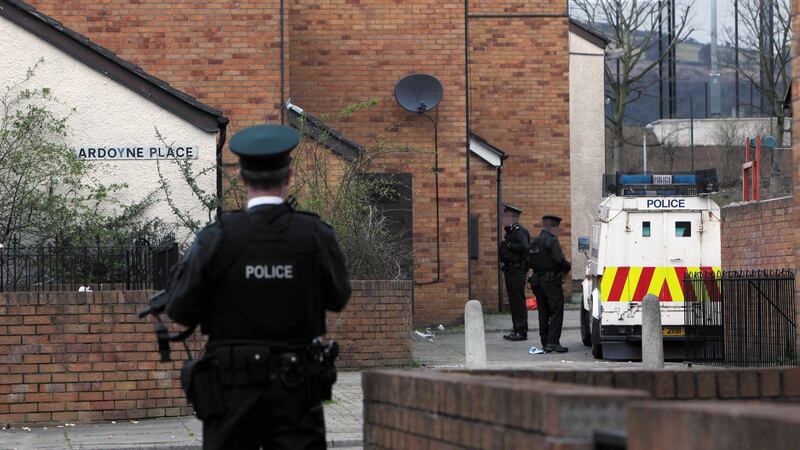 PSNI officers at the scene of the murder in Ardoyne Place in north Belfast in 2014. Picture by Ann McManus&nbsp;