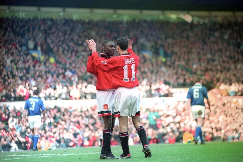 Andy Cole celebrates with Ryan Giggs after scoring one of his five goals in Manchester United's 9-0 win over Ipswich in 1995