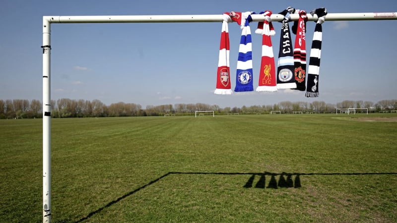 A selection of scarves pictured at Hackney Marshes, London, of Arsenal, Chelsea, Liverpool, Manchester City, Manchester United and Tottenham Hotspur, who announced in a joint statement they are to join a new European Super League. 
