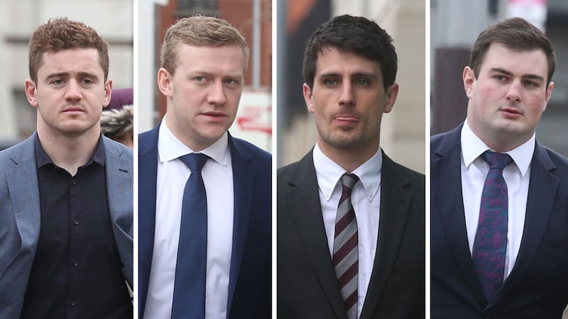 (l-r) Paddy Jackson, Stuart Olding, Blane McIlroy and Rory Harrison pictured arriving at Belfast Crown Court this morning. Photos: Hugh Russell&nbsp;
