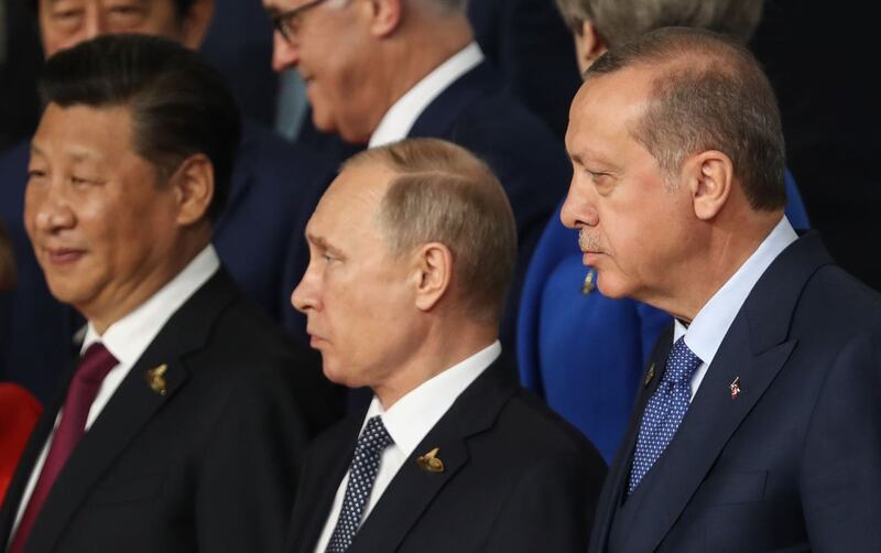 Chinese President Xi Jinping, Russian President Vladimir Putin and Turkish President Recep Tayyip Erdogan (Matt Cardy/PA)