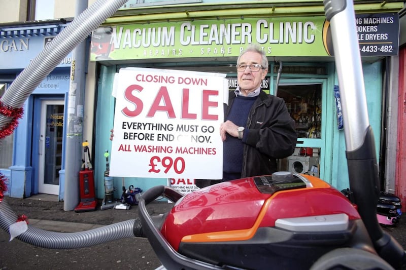 Eugene Keaney outside his Falls Road repair shop that is closing. Picture Mal McCann 