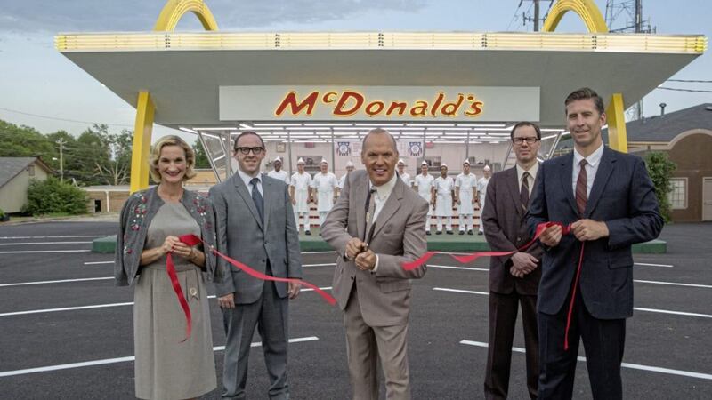 Michael Keaton (centre) stars as McDonald&#39;s mastermind Ray Kroc in The Founder 