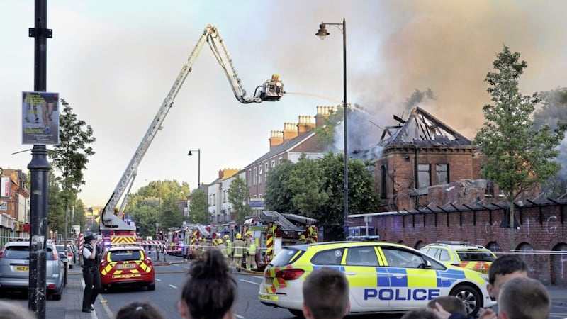 Firefighters tackling the Ormeau Road blaze on Sunday evening. Picture by Cliff Donaldson