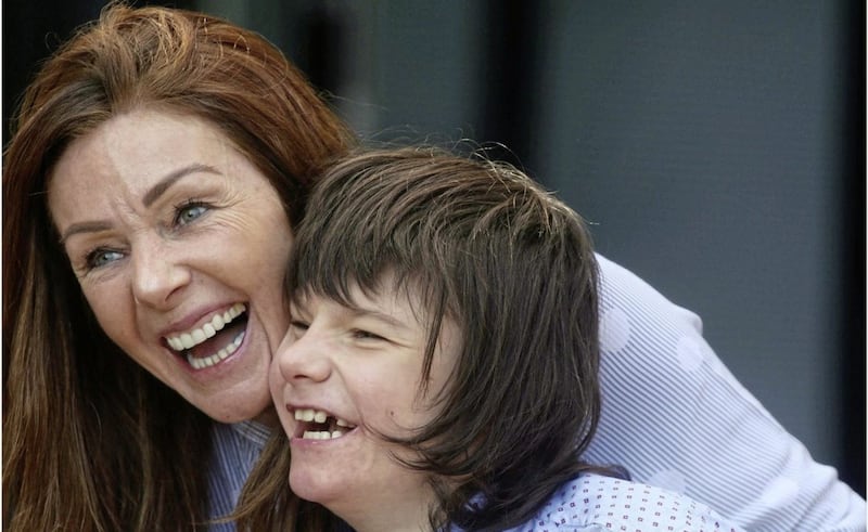 Billy Caldwell and his mother Charlotte pictured on the way out of Department of Health at Stormont. Picture by Hugh Russell
