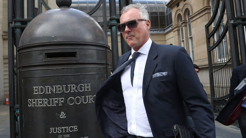 The former TV presenter has gone on trial accused of putting his hand down a woman’s trousers as they danced at her hen night.