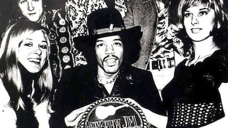 Jimi Hendrix presented with a cake on his 25th birthday in Belfast, 1967, where he performed at the Whitla Hall 