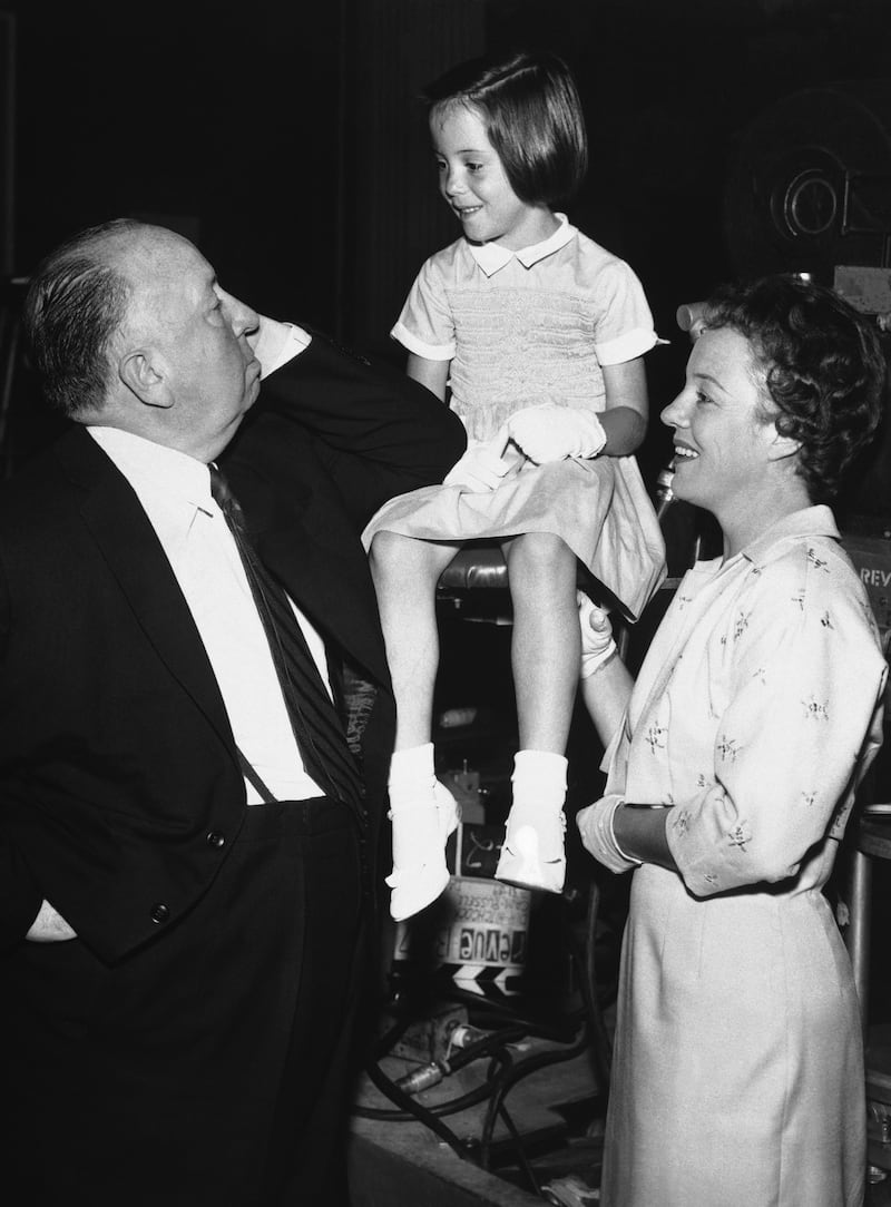 Alfred Hitchcock with his granddaughter and daughter Pat Hitchcock, right (AP Photo)