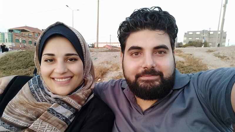 Belfast-born Palestinian Khalid El-Estal pictured with his wife Ashwak, who died last week in Gaza after being injured in an explosion. Their two young children are still  there in a hospital, with efforts being made to bring them to safety.
