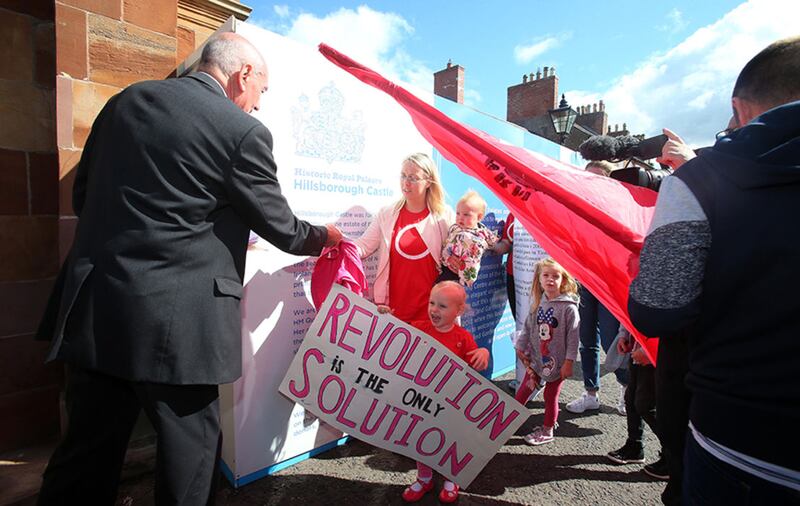 Irish Language activists  (An Dream Dearg ) at Hillsborough Castle today to deliver letters to the Secretary of State James Brokenshire, calling for an act to be implemented. Picture Mal McCann&nbsp;
