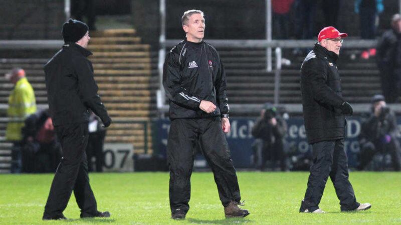 Tyrone manager Mickey Harte and Derry manager Damian Barton eagerly await Sunday's Ulster Championship tussle