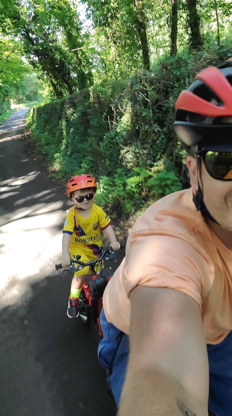 &nbsp;Richie&nbsp;cycling with his son Aedan