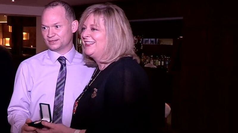Garryowen McMahon accepts the award from LGFA President Marie Hickey &nbsp;