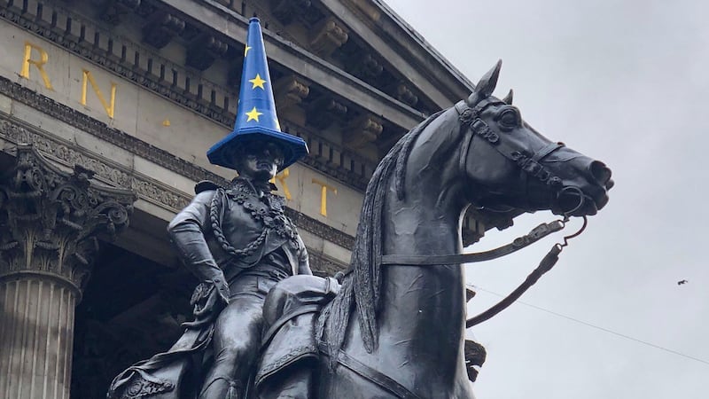 A special blue cone with yellow stars sat atop the Duke of Wellington statue in the hours before Britain officially left the European Union on Friday.