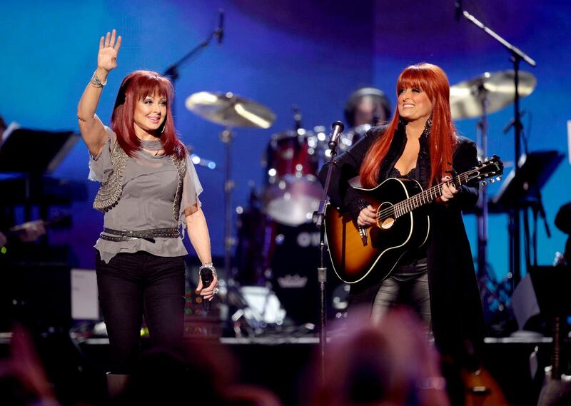 Naomi Judd, left, and Wynonna Judd, of The Judds, performing in Las Vegas in 2011