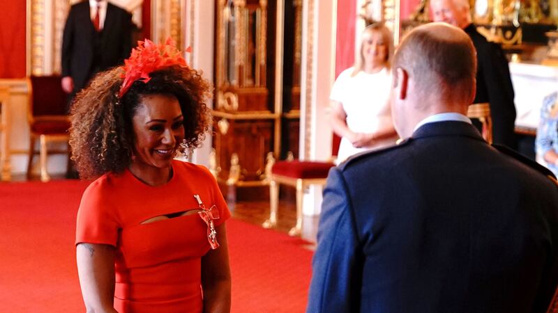 The 46-year-old pop star was honoured at Buckingham Palace.