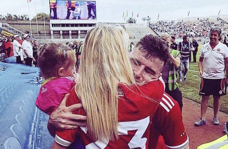 Lisa embraces her brother Connor McAliskey after Tyrone reached the All-Ireland final 