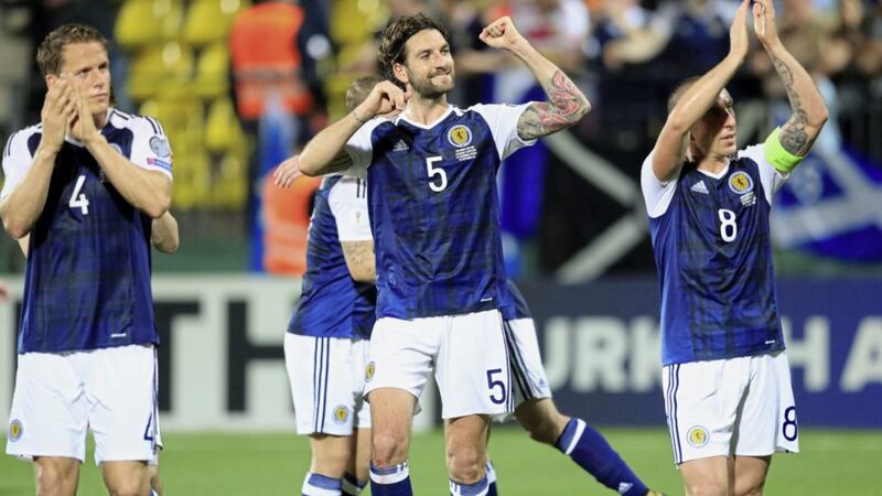 Scotland's Charlie Mulgrew (centre) and his team-mates celebrate after a 3-0 win over Lithuania