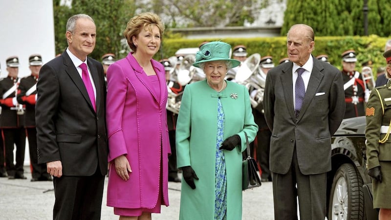 File photo dated 17/05/11 of Queen Elizabeth II (second right) with Irish President Mary McAleese (second left) after arriving at Aras an Uachtarain (The Irish President&#39;s official residence) in Phoenix Park, Dublin, Ireland, as Dr Martin McAleese (far left) and The Duke of Edinburgh (far right) look on. As the Queen reaches 25,000 days on the throne on Saturday, the PA news agency looks at some of the events and milestones of her reign.. 