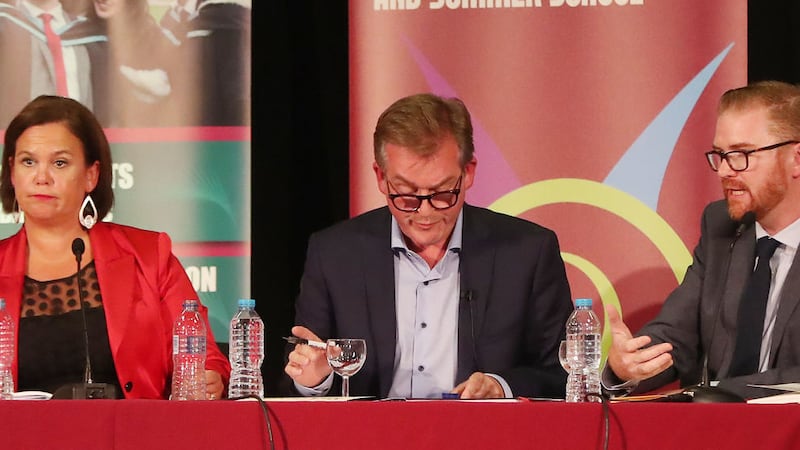 (left to right) Mary Lou McDonald of Sinn F&eacute;in, moderator Mark Carruthers and Simon Hamilton of the DUP at the F&eacute;ile an Phobail leaders' debate. Picture by Niall Carson, Press Association&nbsp;