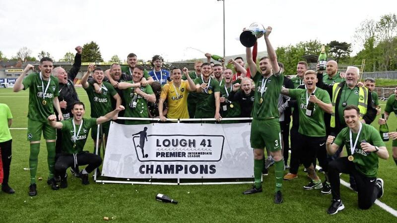 Newington celebrate their Premier Intermediate League triumph last Saturday 
