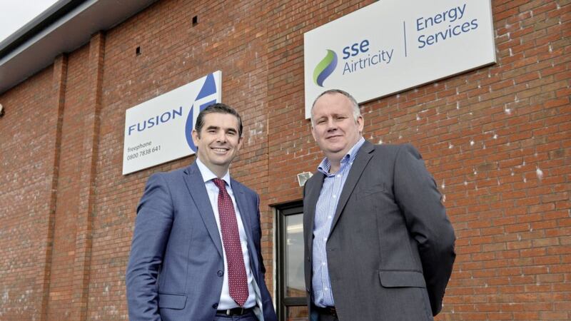 Stuart Hobbs of SSE Airtricity with Bill Cherry, managing director of Fusion Heating  