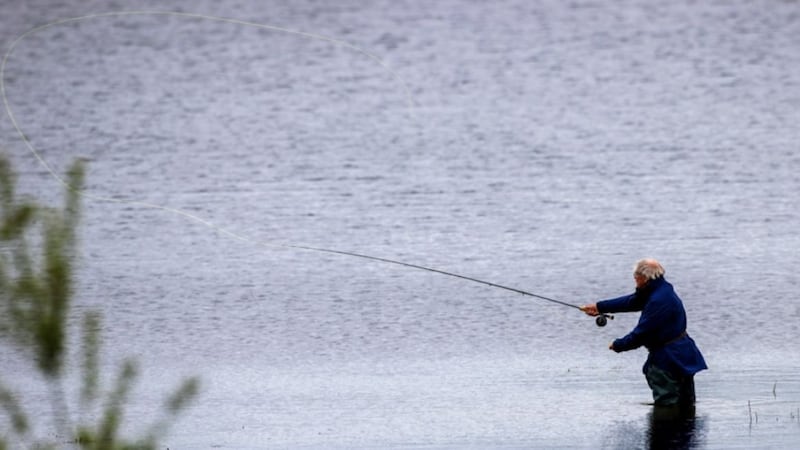 &nbsp;An angler fly fishing on the bank of Creighton's Green outside Bangor, Co Down. Picture by Liam McBurney, Press Association