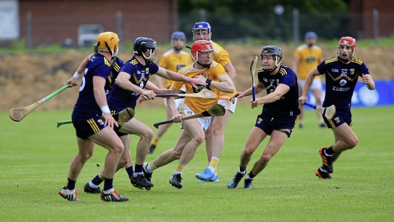 James McNaughton breaks through a ruck of Wexford players during Saturday&#39;s exciting draw at Corrigan Park Picture: Seamus Loughran 
