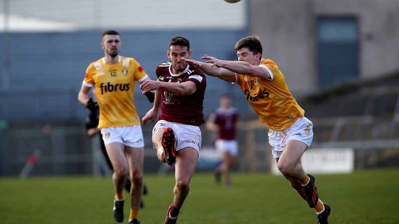  Westmeath's Sam Duncan  in action with Antrim's  Patrick Mc Cormick in Sunday's Allianz Football League game in Mullingar                                   Picture: Seamus  Loughran