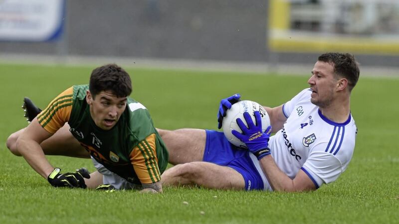 Tony Brosnan of Kerry tackles Monaghan captain Ryan Wylie in the Allianz Football League Division One clash at Inniskeen on Saturday October 17 2020 