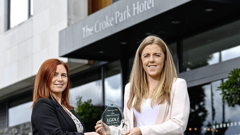 Antrim&rsquo;s Cathy Carey, right, is presented with The Croke Park/LGFA Player of the Month award for August by Edele O&rsquo;Reilly, Director of Sales and Marketing at The Croke Park in Jones Road, Dublin. Cathy captained Antrim to the TG4 All-Ireland Junior Championship title on August 13 at Armagh&rsquo;s Athletic Grounds. In the replay against Fermanagh, Cathy scored 2-1 in a Player of the Match performance Picture: David Fitzgerald/Sportsfile 